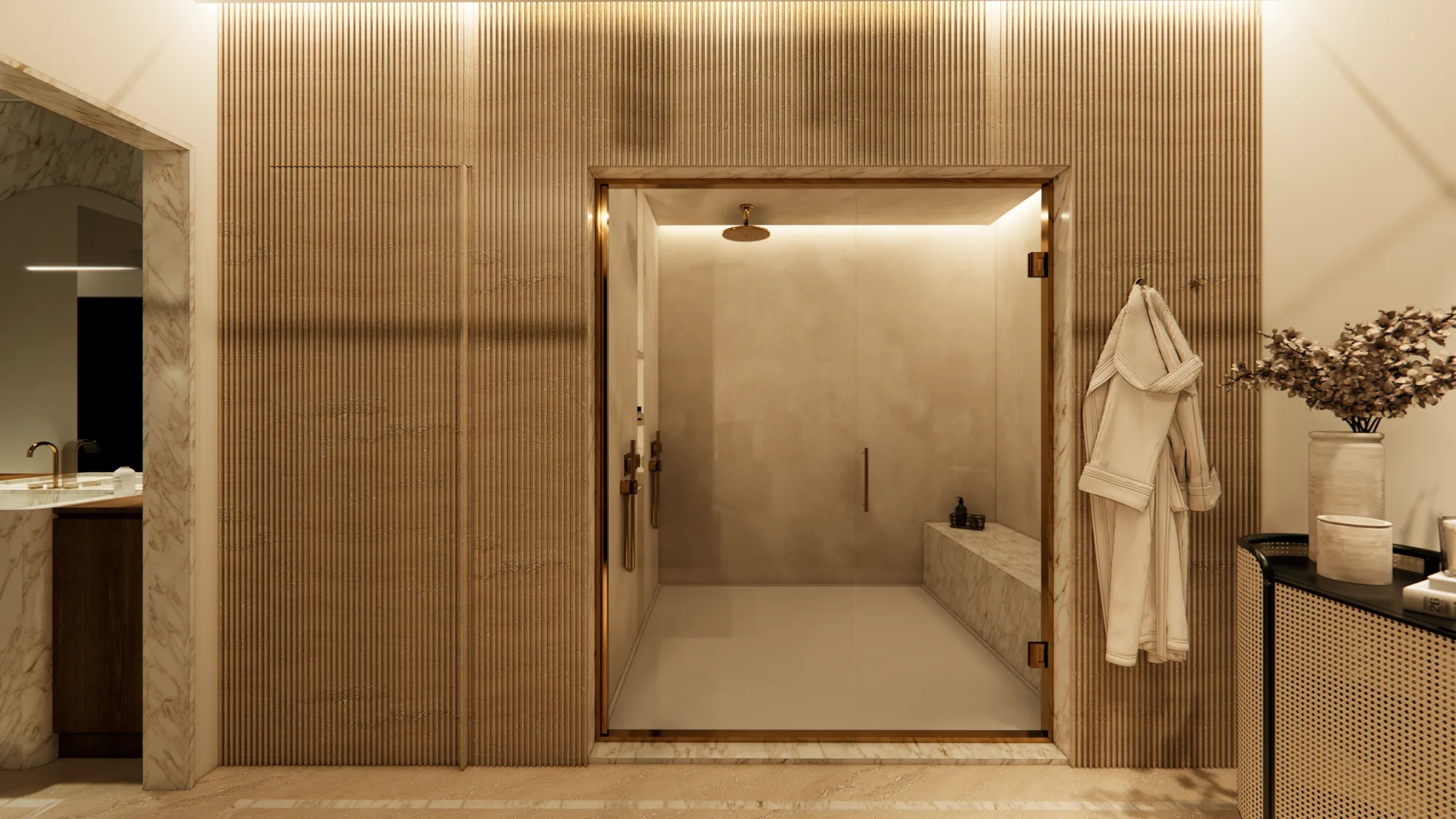Stone-clad walk-in shower with brushed brass fixtures